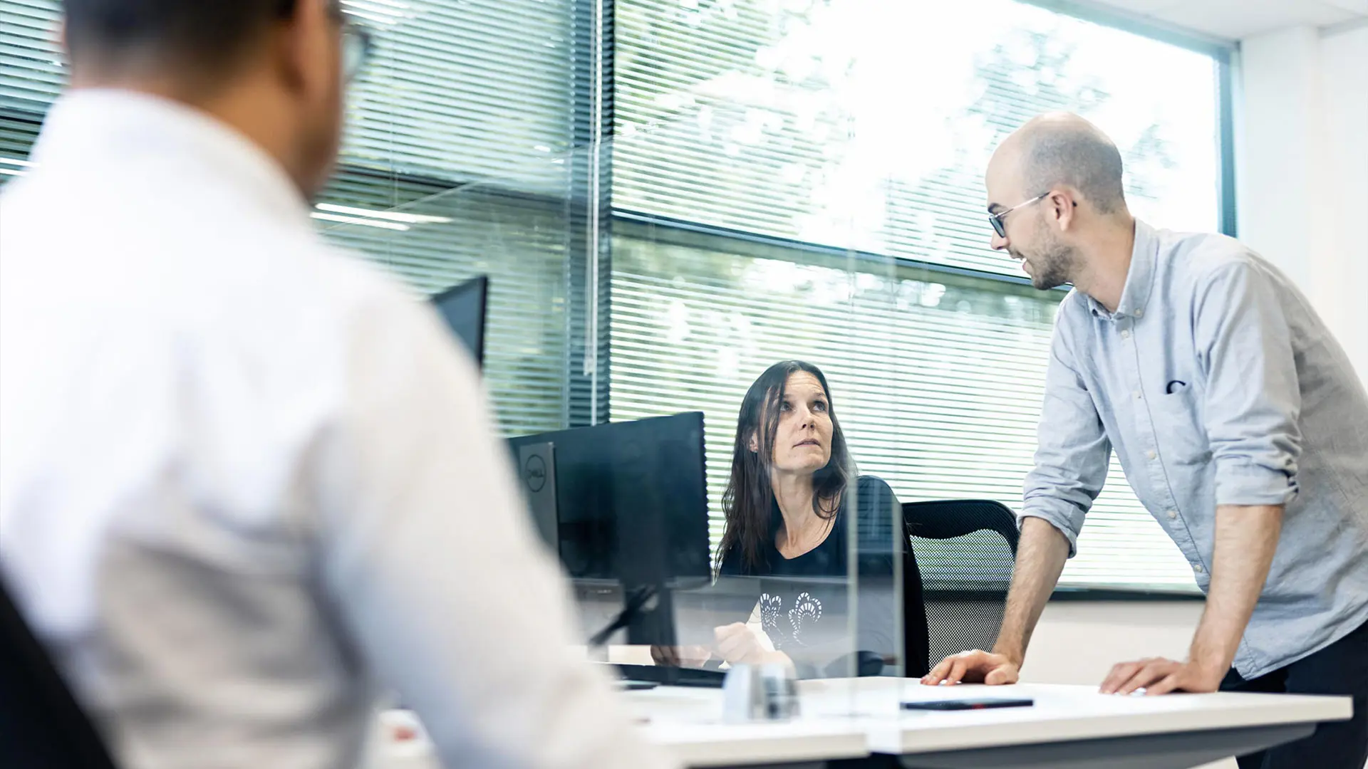 Men and women in an office