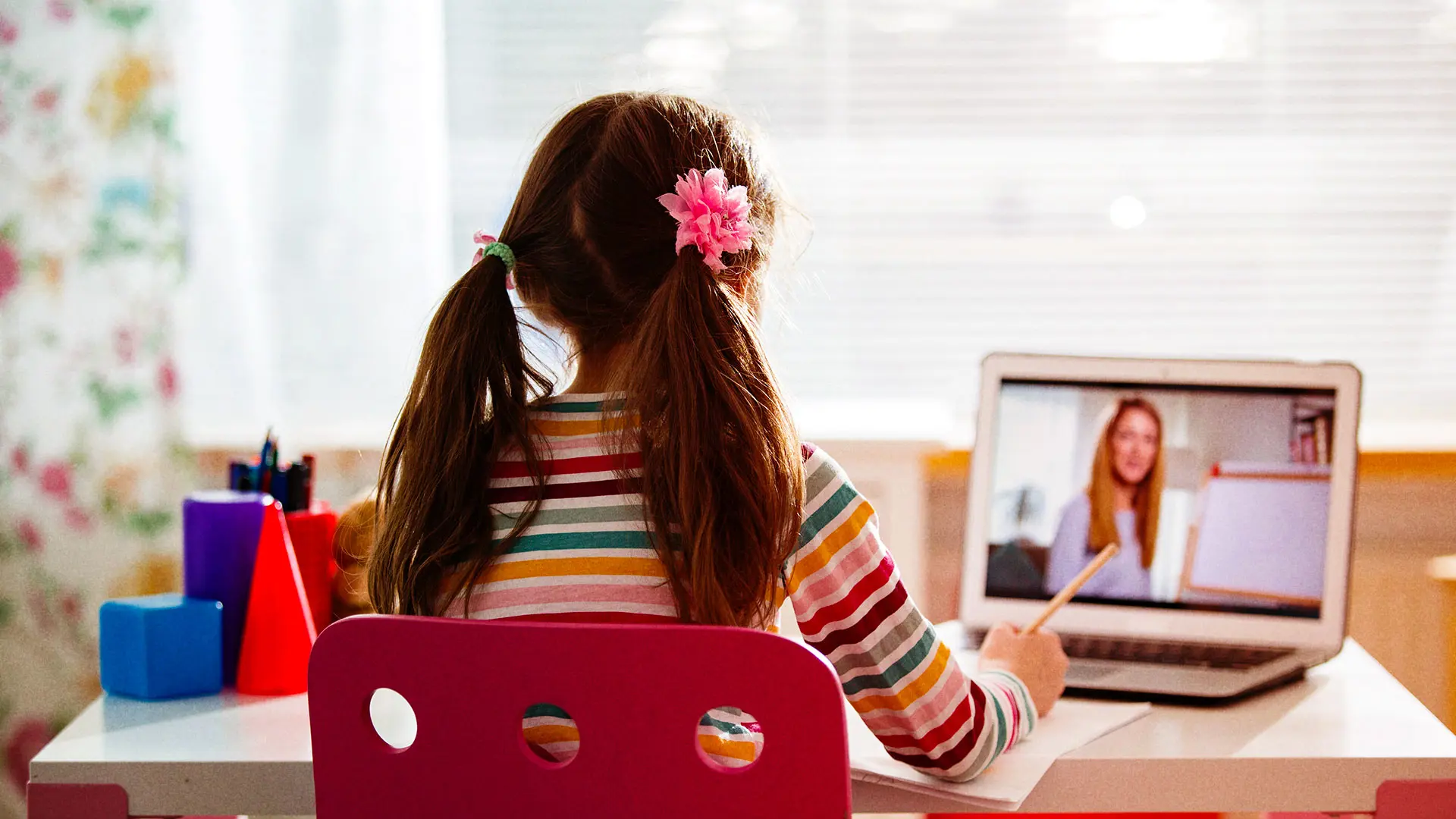 Child sitting at desk