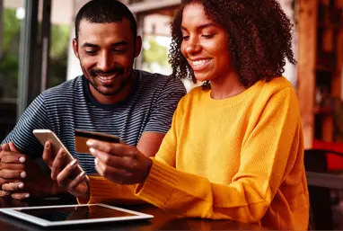 Two people at computer